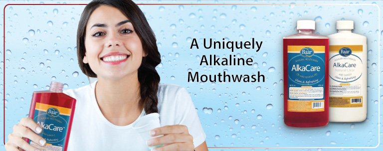 Girl Holding Baar Products AlkaCare Alkaline Mouthwash and Gargle For Oral Health, Mouth Ulcers, Tooth Decay, Plaque, Alkalizing.